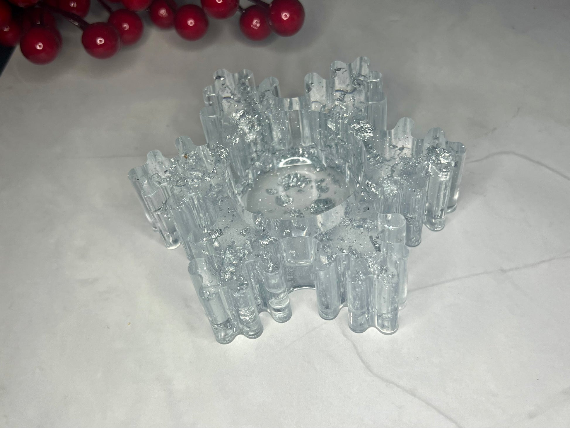 a group of clear glass objects sitting on a table