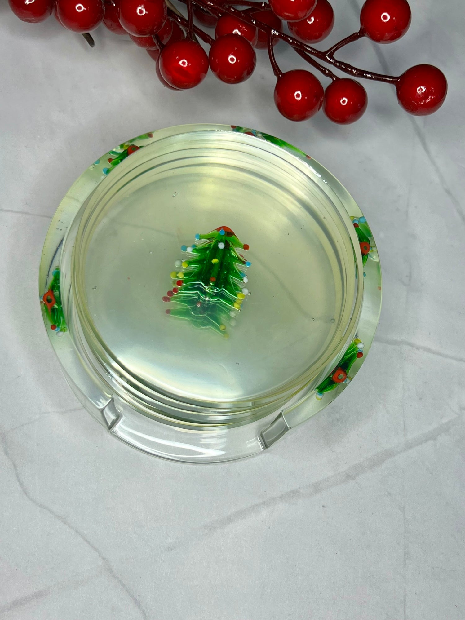 a glass plate with a christmas tree on it