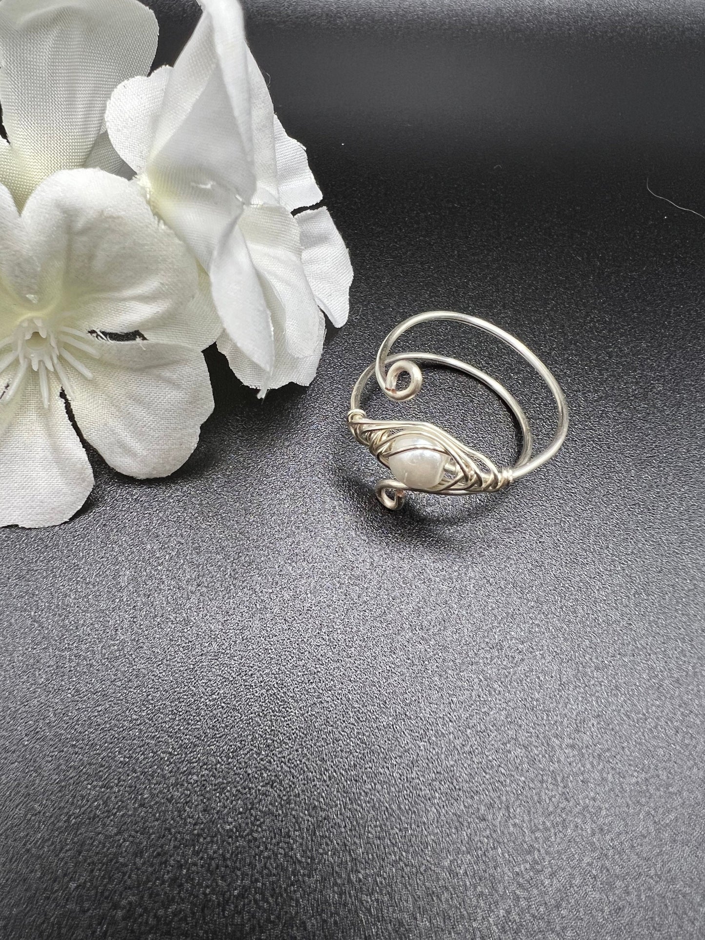 Pearl Nestled in a Birds Nest Ring