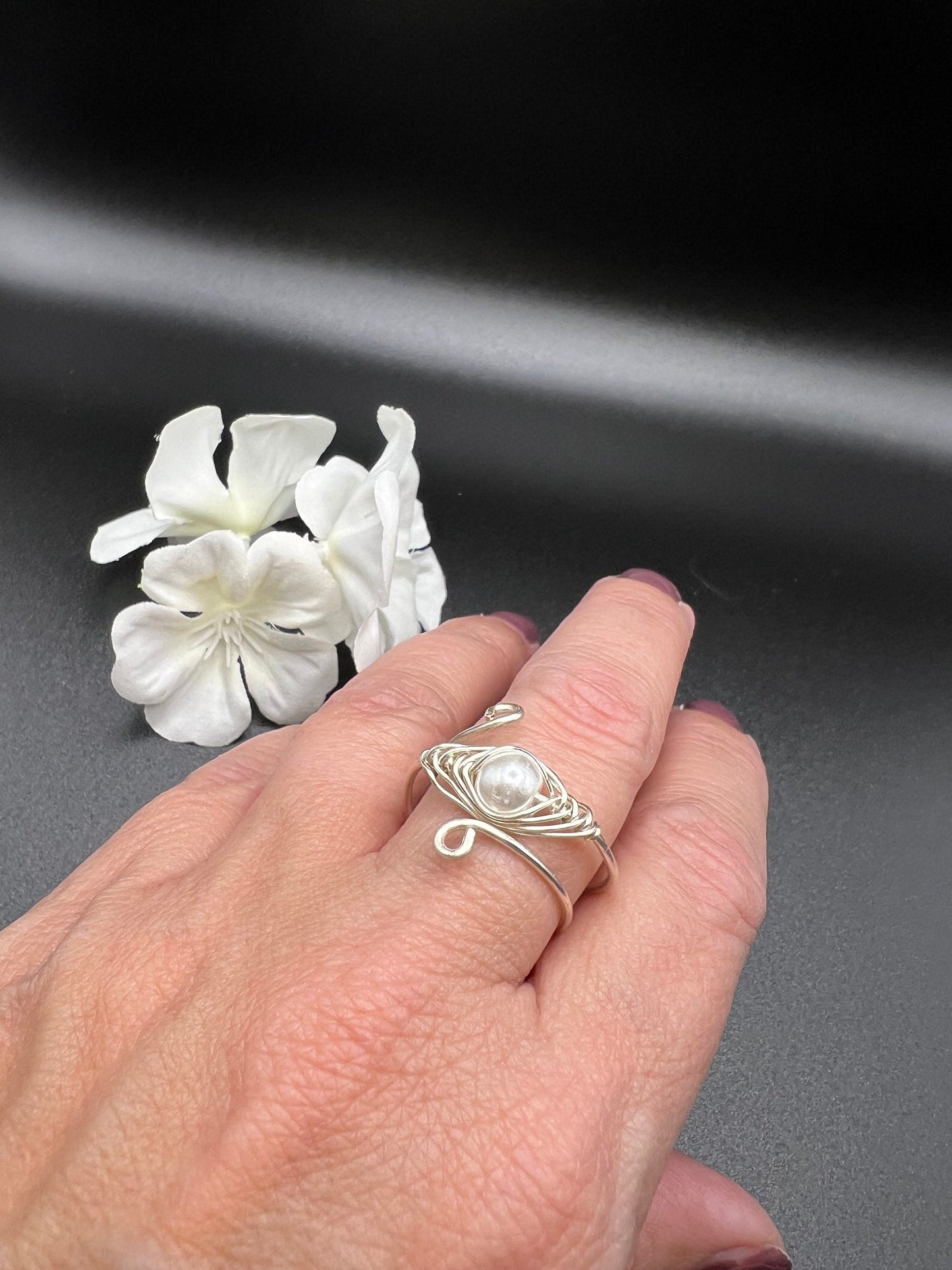 Pearl Nestled in a Birds Nest Ring