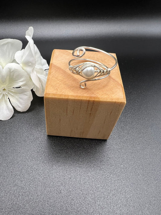 Pearl Nestled in a Birds Nest Ring