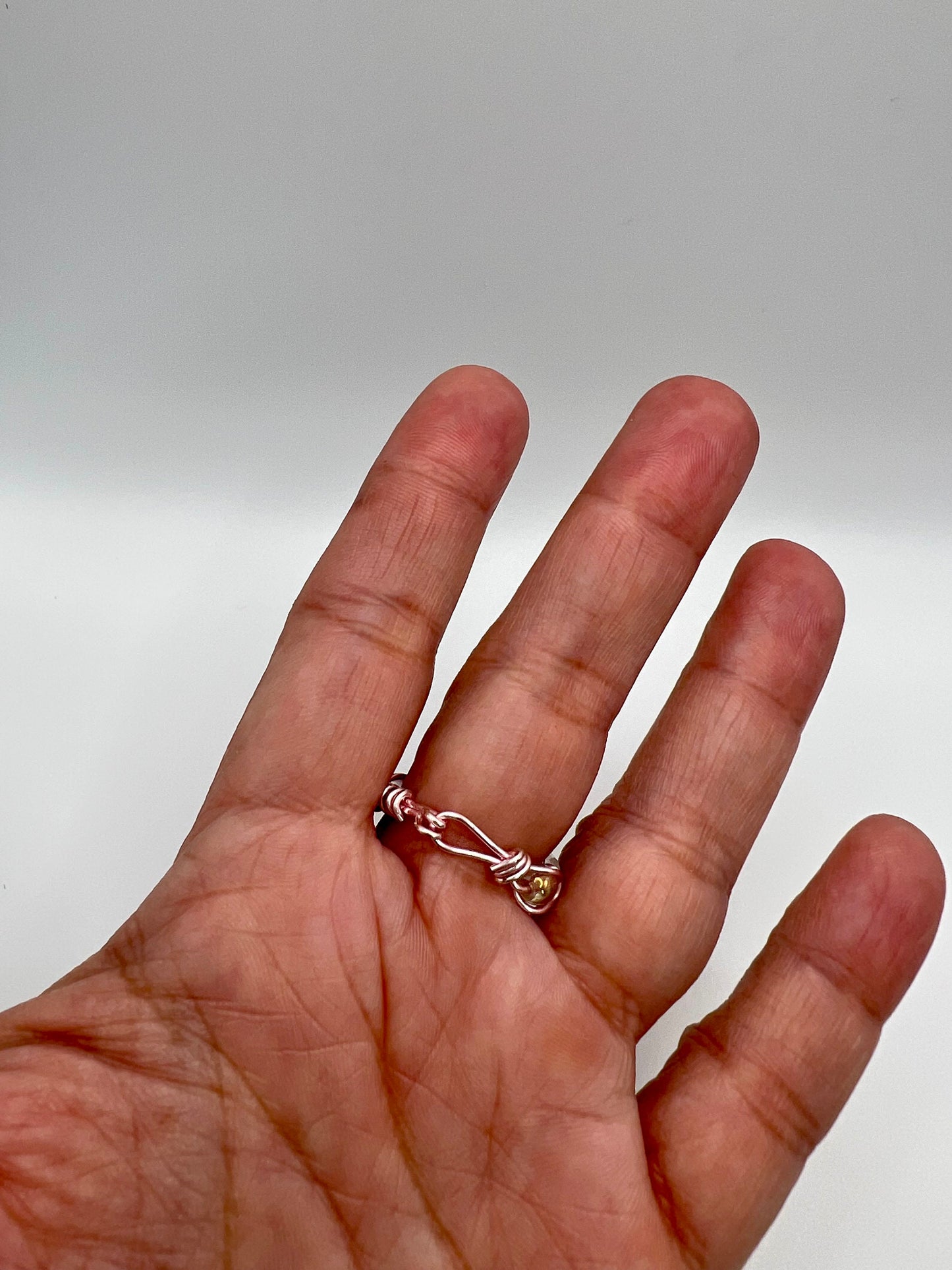 Dainty Pinky and Rose Gold Wire-Wrapped Braid Ring